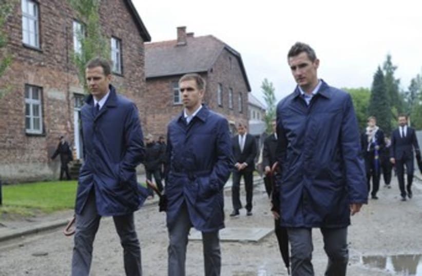 German soccer players at Auschwitz 370 (photo credit: REUTERS/POOL New)