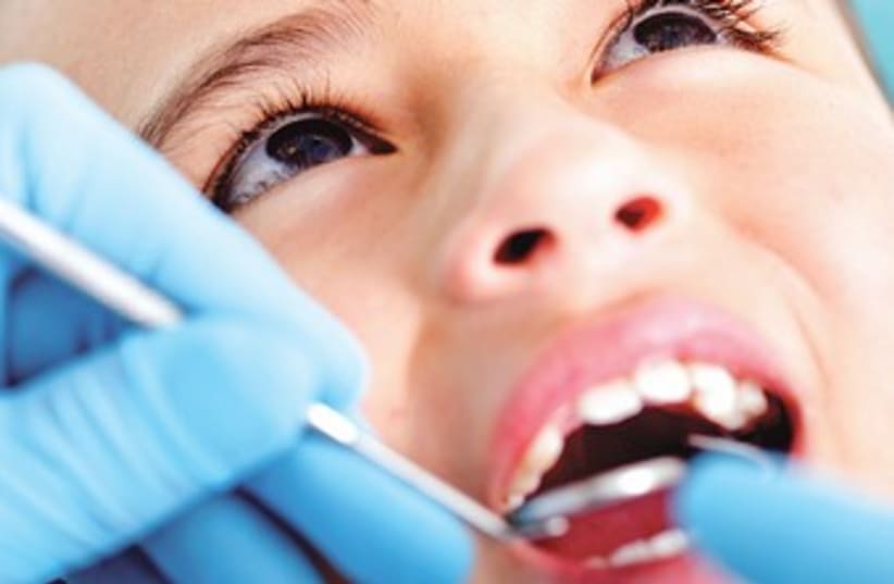 Child at the dentist 370 (photo credit: Thinkstock)