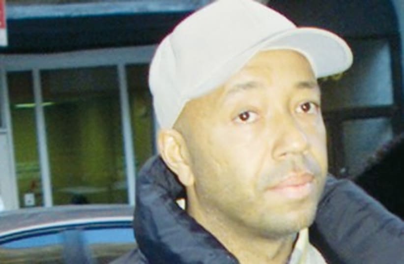 RUSSELL SIMMONS 370 (photo credit: Reuters)
