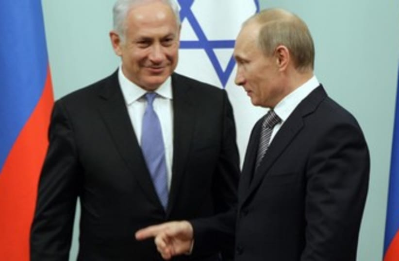 Russia's Putin with Netanyahu in Moscow 370 (R) (photo credit: RIA Novosti / Reuters)