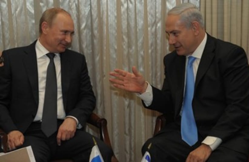 Netanyahu and Putin 390 (photo credit: Amos Ben Gershom / GPO)