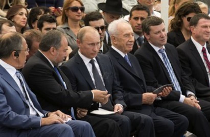 Russian President Putin attends ceremony 370 (photo credit: POOL New / Reuters)