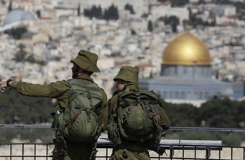 IDF soldiers view Old City of J'lem from Mt. of Olives 37 (photo credit: Darren Whiteside / Reuters)