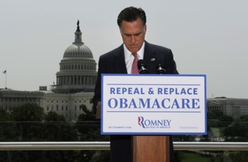 Romney reacts to Health Ruling 390 (photo credit: Jonathan Ernst / Reuters)