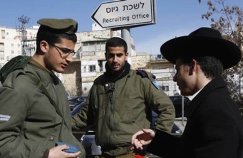 Haredi with IDF soldiers 370 (photo credit: REUTERS/Baz Ratner)