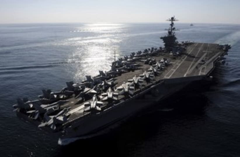 US Naval aircraft carrier in Strait of Hormuz 370 (photo credit: REUTERS)