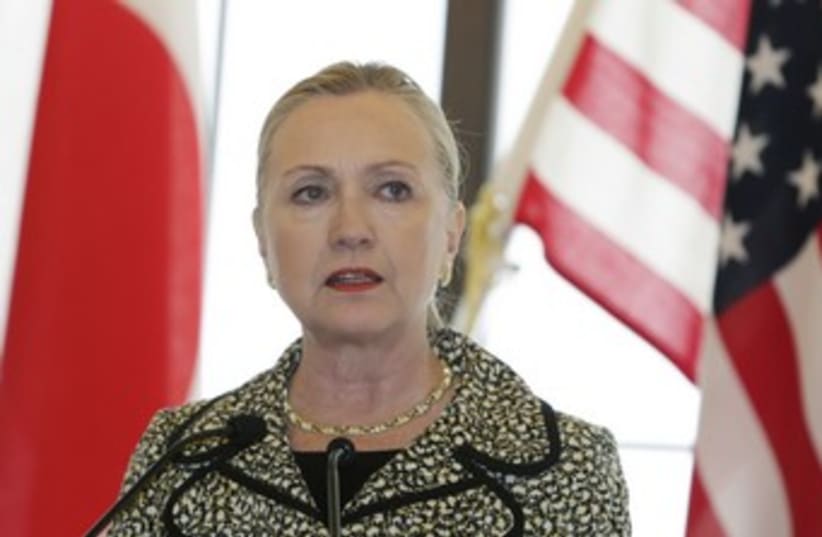 US Secretary of State Hillary Clinton in Japan 370 (R) (photo credit: Toru Hanai / Reuters)