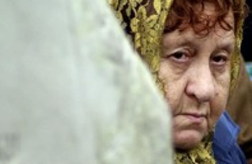 Woman vists Jedwabne pogrom memorial R300 (photo credit: Reuters)