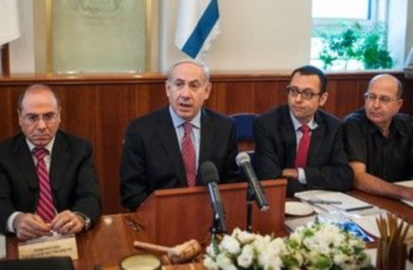 Prime Minister Binyamin Netanyahu at cabinet meeting 370  (photo credit: Pool / Flash 90)