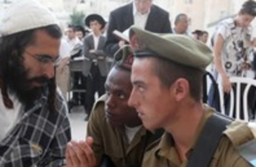 Orthodox man talks with soldiers 300 (photo credit: Marc Israel Sellem)
