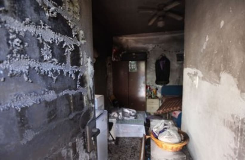 Suspected arson at Eritrean's apartment 390 (photo credit: Marc Israel Sellem)