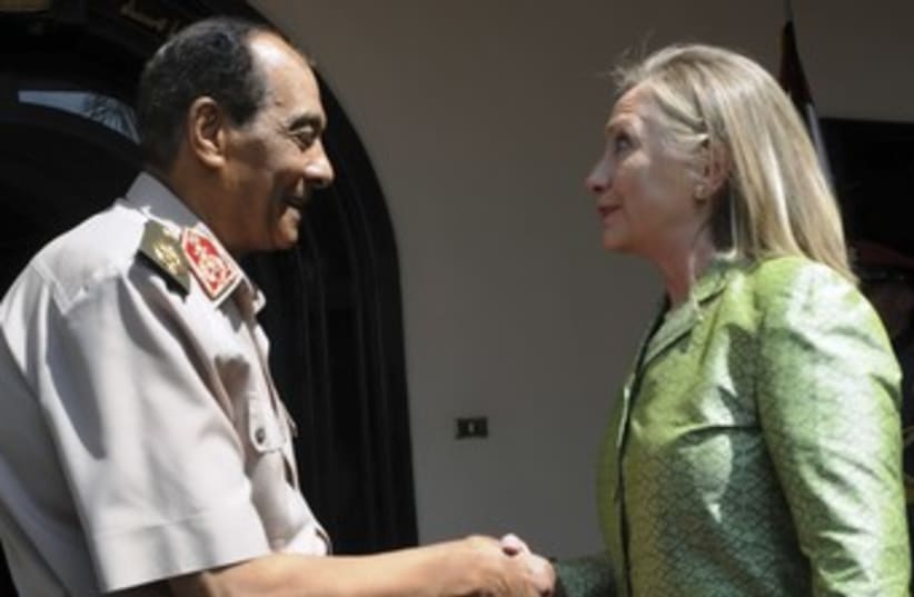 Hillary Clinton with Egypt's Tantawi 370 (R) (photo credit: reuters / handout)