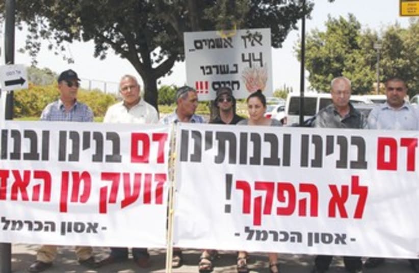 Bereaved families near the Knesset in July 2011 (photo credit: Marc Israel Sellem/The Jerusalem Post)