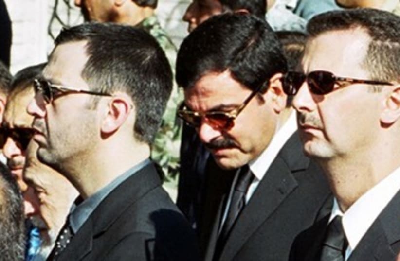 Syrian President Assad's brother Maher (L) 370 (R) (photo credit: REUTERS)