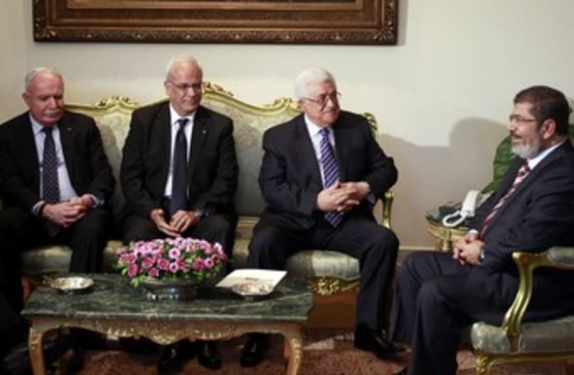 Abbas meets Mursi 370 (photo credit: REUTERS)