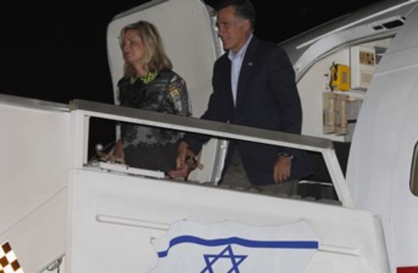Romney and wife exit plane in Israel 370 (photo credit: Reuters)
