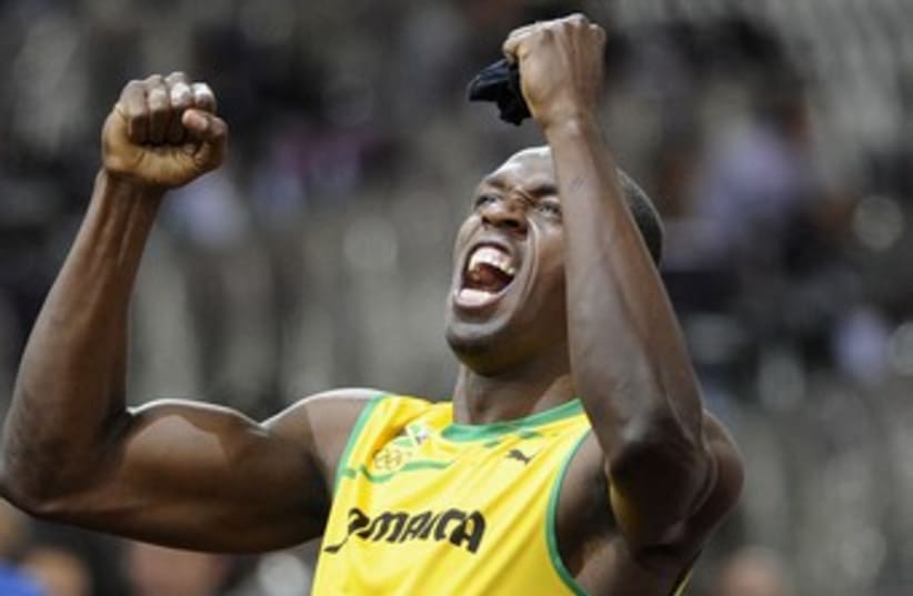 Usain Bolt (photo credit: Reuters/Paul Hackett)