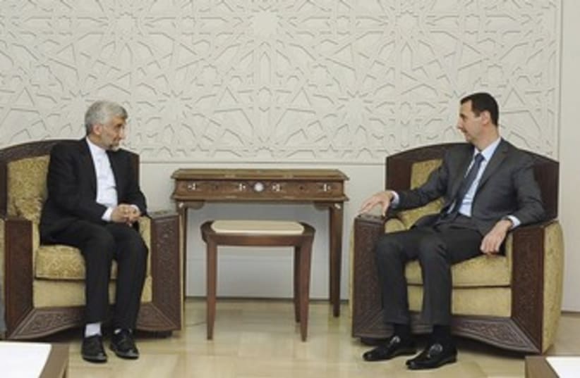 Syria's Assad meets Iran's Jalili 370 (photo credit: REUTERS/Sana Sana)
