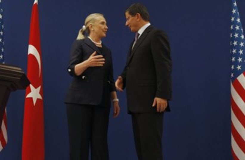 Clinton and Davutoglu (R370) (photo credit: REUTERS/Osman Orsal)