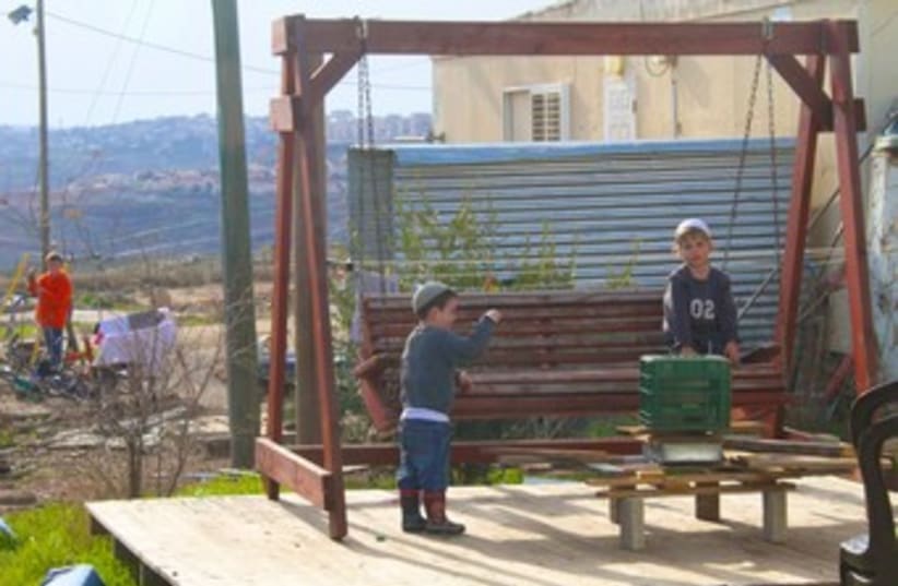 Jewish children play at Migron outpost 370 (photo credit: TOVAH LAZAROFF)