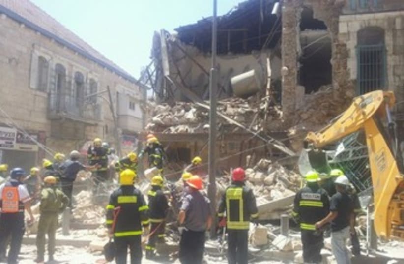 Building collapses in Jerusalem neighborhood Geula 370 (photo credit: Yitzhak Ashraf Jerusalem MDA)