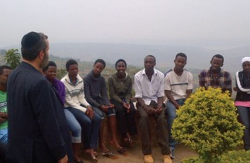 SHMULEY BOTEACH with Rwandan students 370 (photo credit: Courtesy)