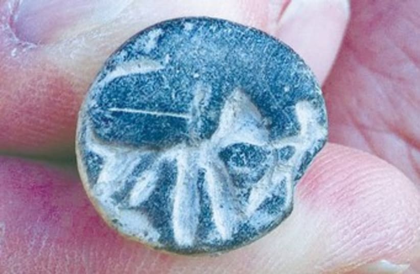 A TWELFTH-CENTURY BCE seal (photo credit: Courtesy of Tel Aviv University)