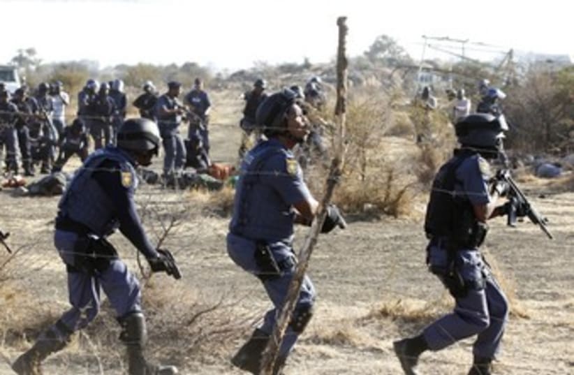 South African police clash with strikers 370 (photo credit: REUTERS)