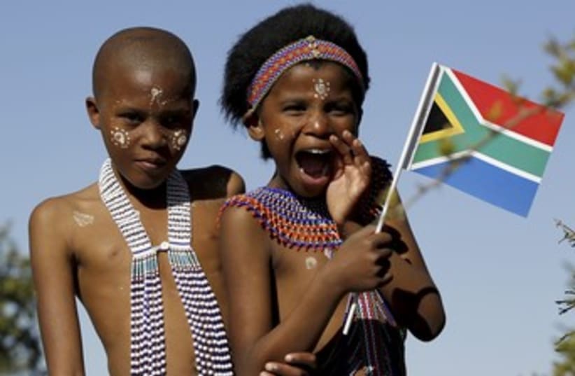 South Africa Flag and Kids (R370) (photo credit: REUTERS/Siphiwe Sibeko)