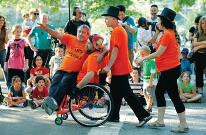 Disabilities wheelchair disabled 521 (photo credit: Moshe Shai)