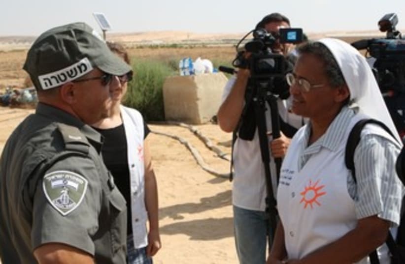 PHR volunteers and security officials near Egypt border 370 (photo credit: Ben Hartman)