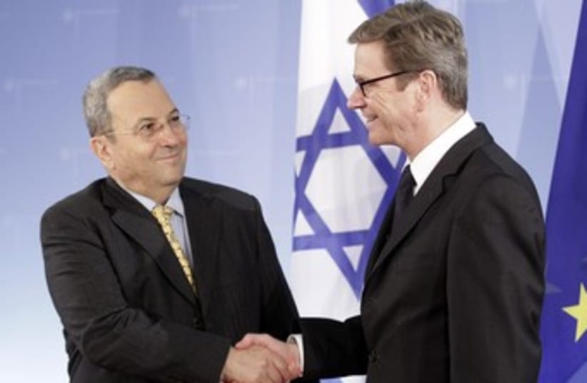 Barak shakes hands with Westerwelle 370 (photo credit: REUTERS/Tobias Schwarz)