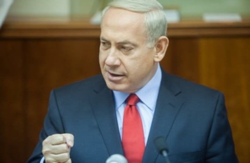 Prime Minister Binyamin Netanyahu at cabinet meeting 370 (photo credit: Pool/ Emil Salman )