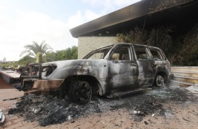 Scene of attack on US consulate in Libya 370 (R) (photo credit: Esam Al-Fetori / Reuters)