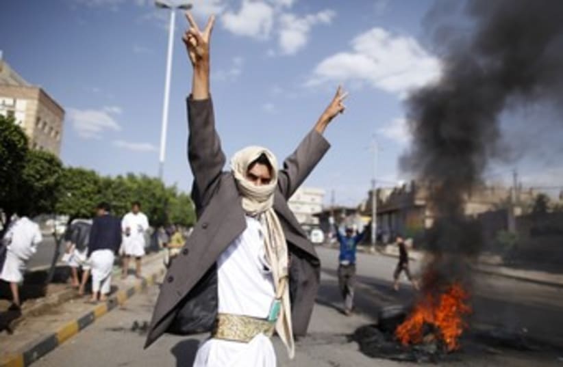 Protests outside US Embassy in Sanaa, Yemen 370 (R) (photo credit: Khaled Abdullah Ali Al Mahdi / Reuters)