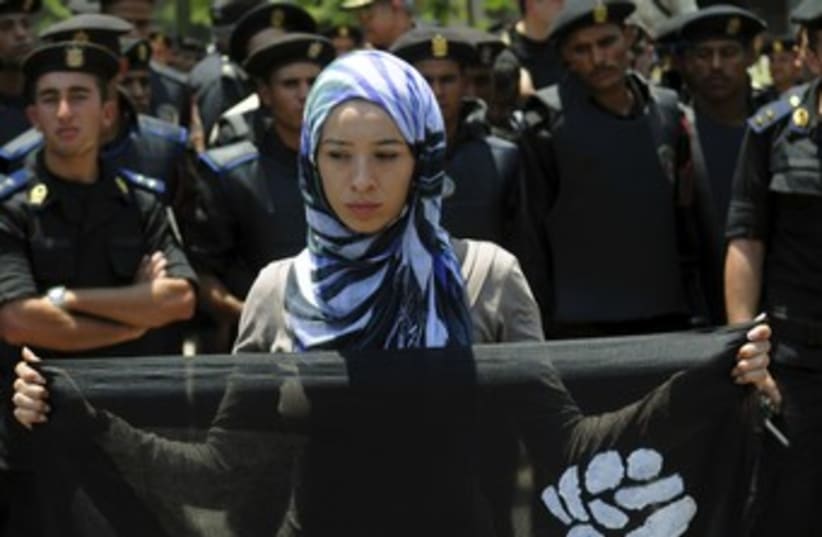 Egyptian woman protests in Cairo 370 (photo credit: REUTERS/Mohamed Abd El Ghany)