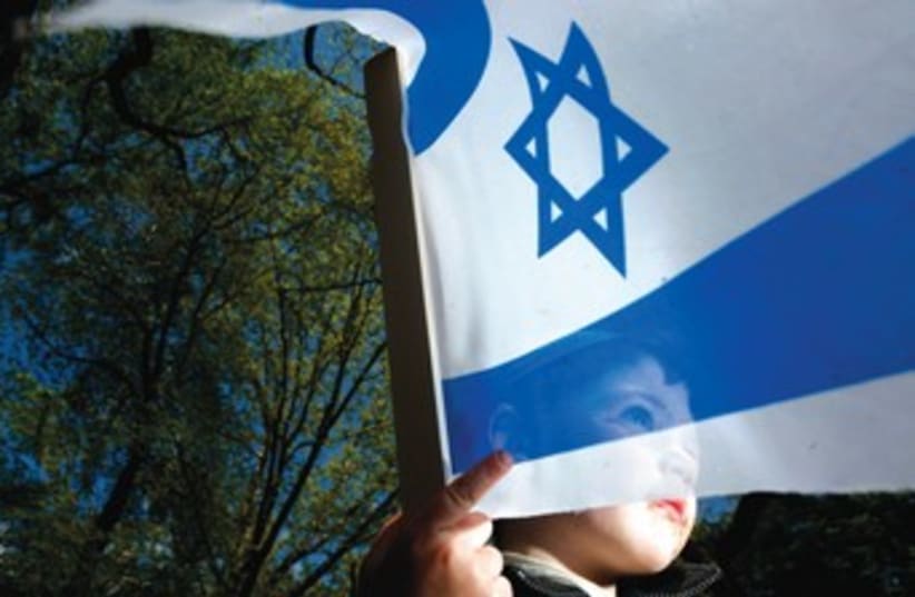 Child with Israel flag 370 (photo credit: Courtesy)