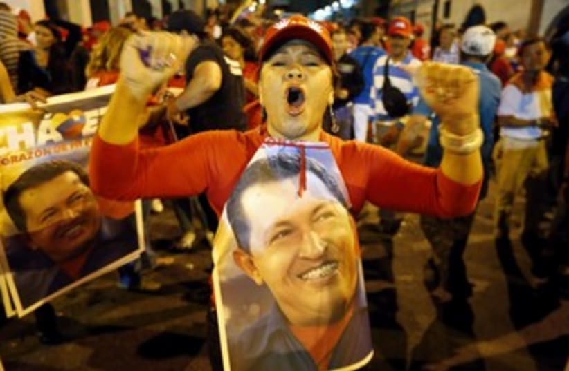 Supporters of Venezuela's Hugo Chavez celebrate 370 (R) (photo credit: Jorge Silva / Reuters)