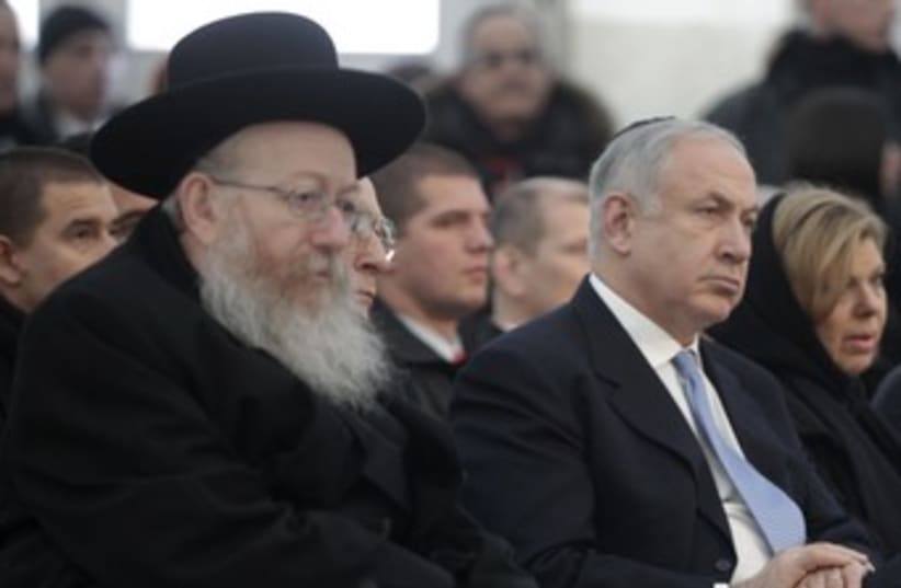 Litzman sits with Netanyahu 370 (photo credit: REUTERS/Peter Andrews)