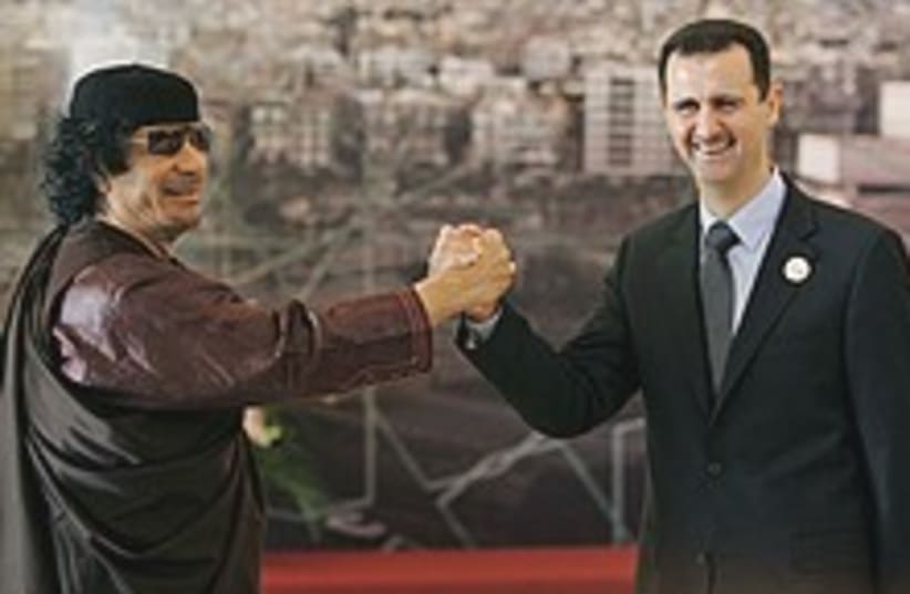 Assad Gadhafi yo yo 224. (photo credit: AP)