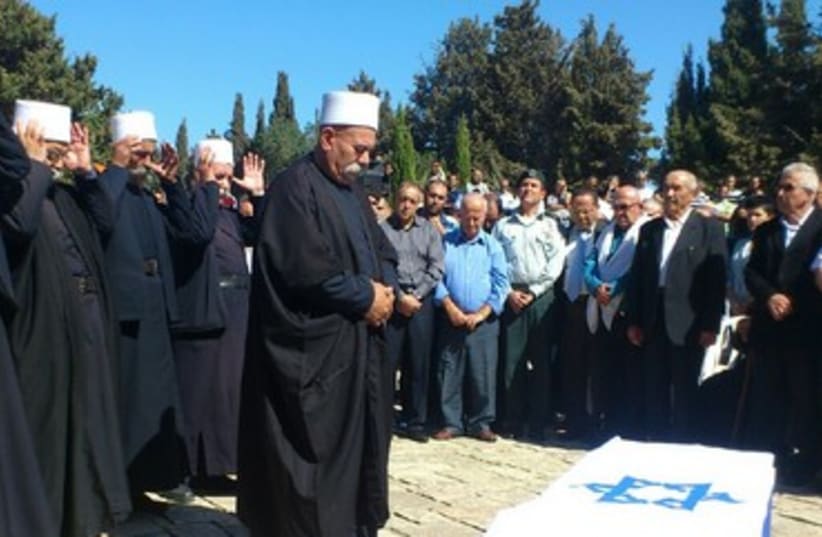 Druse mourn at funeral of Majdi Halabi  (photo credit: Ben Hartman)