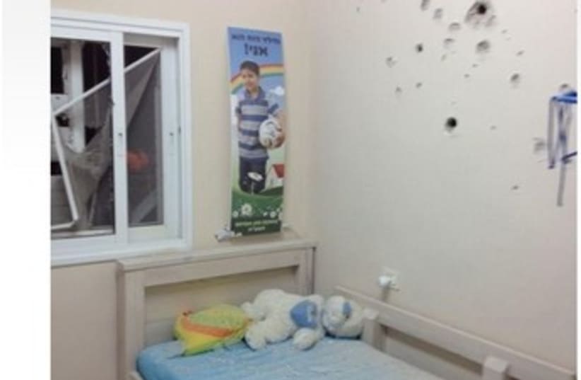 Bedroom damaged in Grad rocket attack 370 (photo credit: IDF Spokesman’s Office)