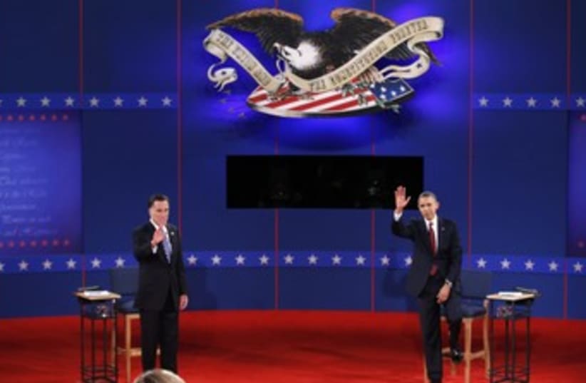Romney, Obama shake hands at town hall debate 370 (photo credit: REUTERS/Mike Segar)