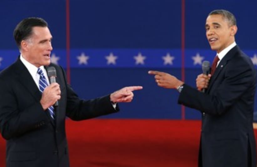 Romney, Obama point at eachother during debate 370 (photo credit: REUTERS/Mike Segar)