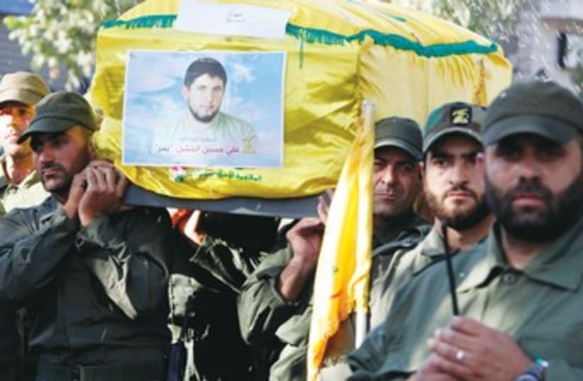 Hezbollah funeral 370 (photo credit: Mohamed Azakir/Reuters)