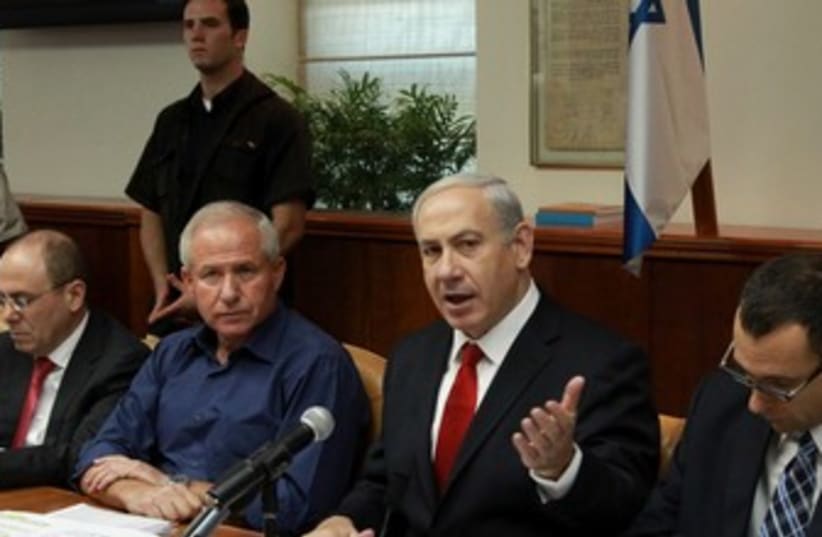 Netanyahu at start of cabinet meeting 370 (photo credit: Marc Israel Sellem/The Jerusalem Post)
