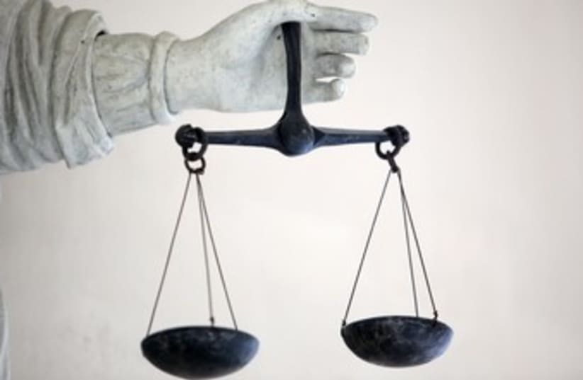 Scales of Justice 370 (photo credit: REUTERS / Stephane Mahe)
