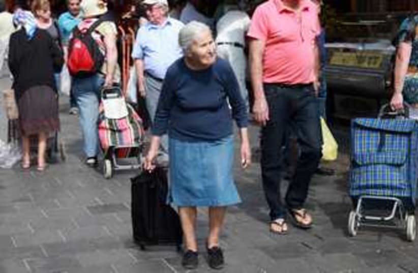 Old woman in Mahane Yehuda 370 (photo credit: Marc Israel Sellem)
