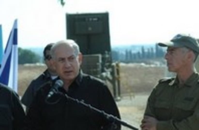 Netanyahu and Barak at Iron Dome site 300 (photo credit: GPO / Amos Ben-Gershom)
