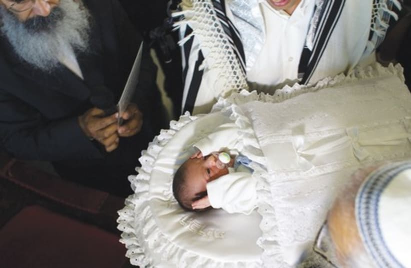 Baby undergoes circumcision R 370 (photo credit: REUTERS)